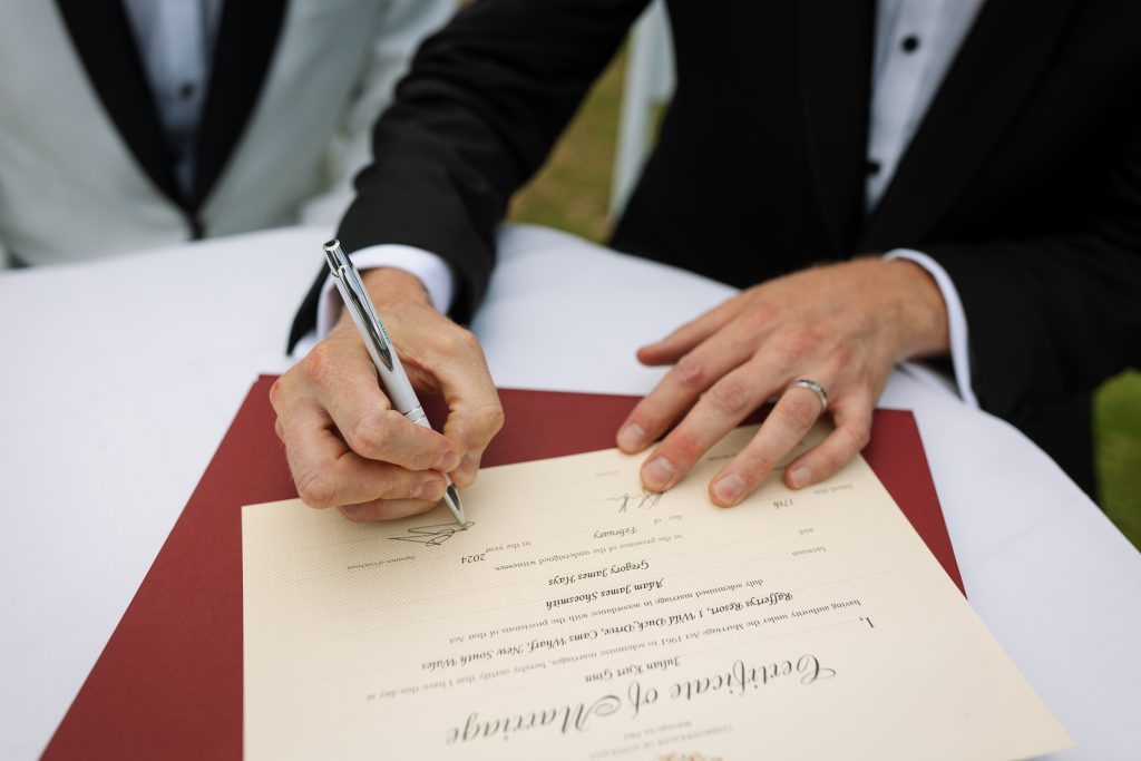same sex marriage at raffertys resort during the ceremony signing the legal papers