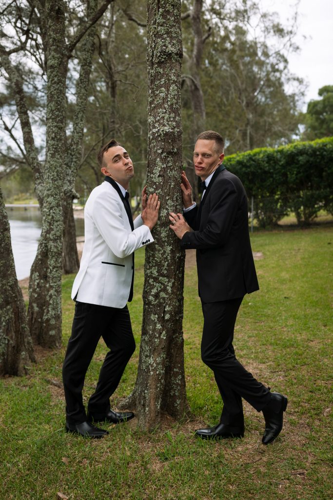 husband and husband at raffertys resort during the groom photo shoot