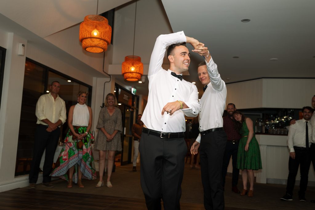 husband and husbands first dance at a wedding reception at raffertys resort
