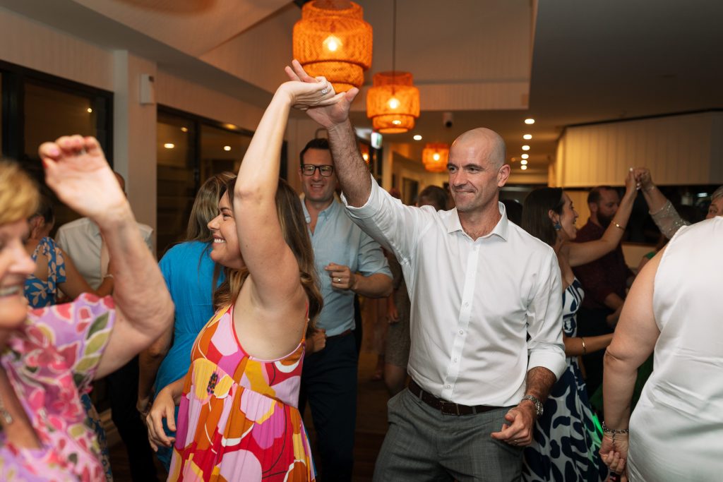 guests dancing at a wedding reception at raffertys resort