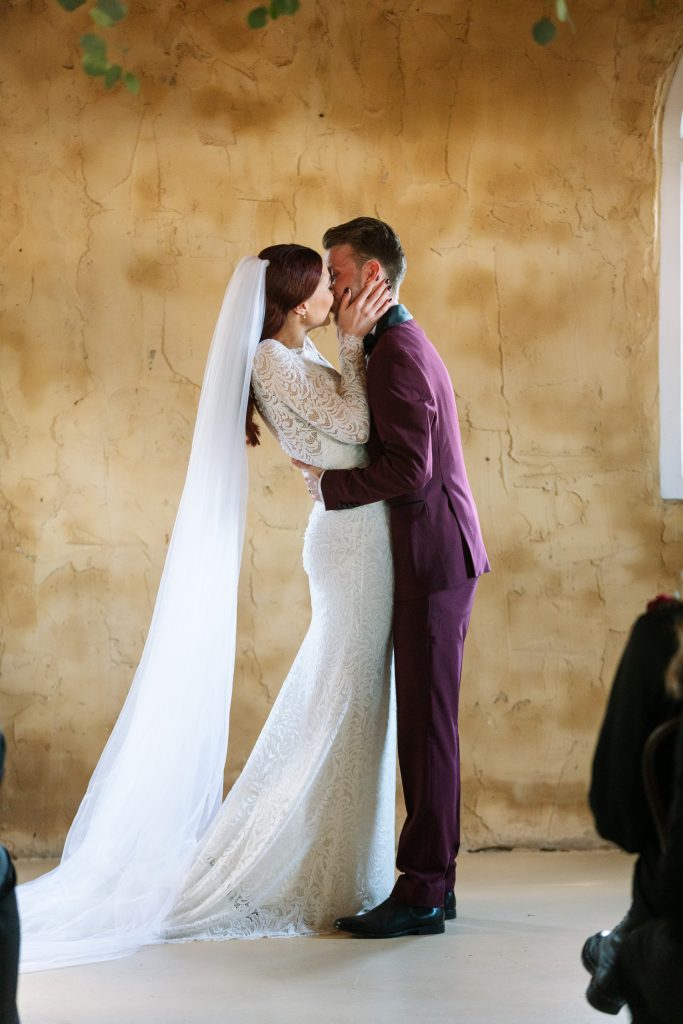 wedding ceremony with the first kiss at a wedding venue in a chapel in the hunter valley