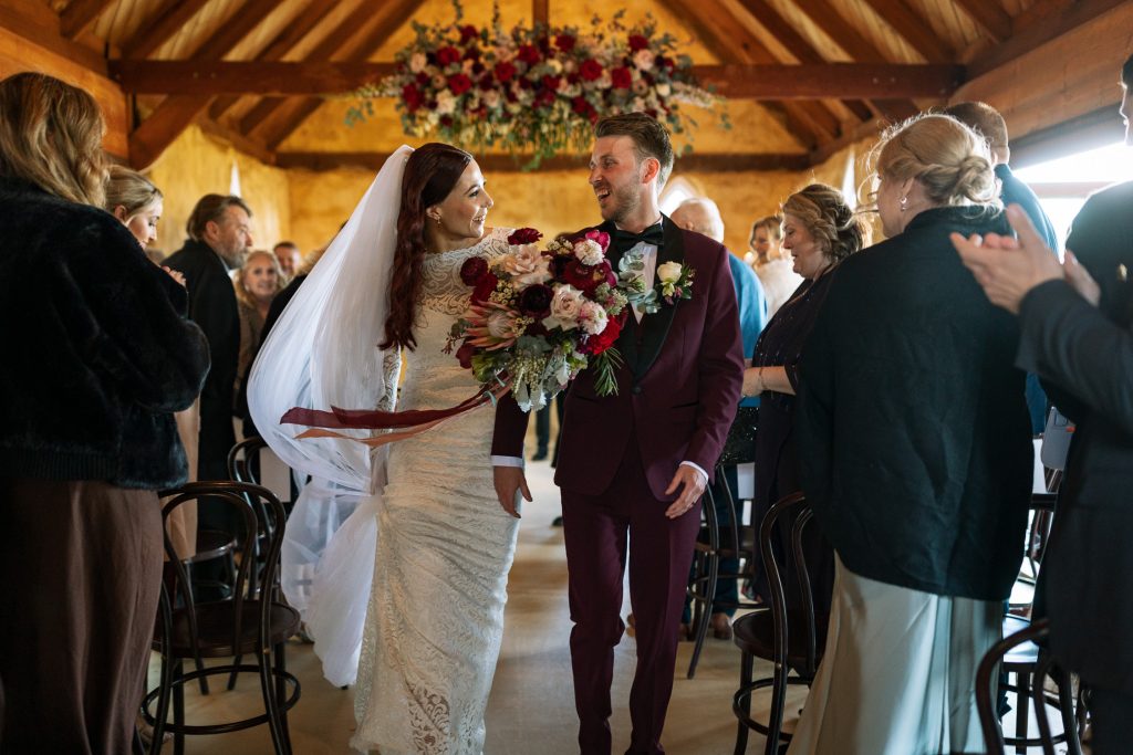 wedding ceremony exiting the isle at a wedding venue in a chapel in the hunter valley