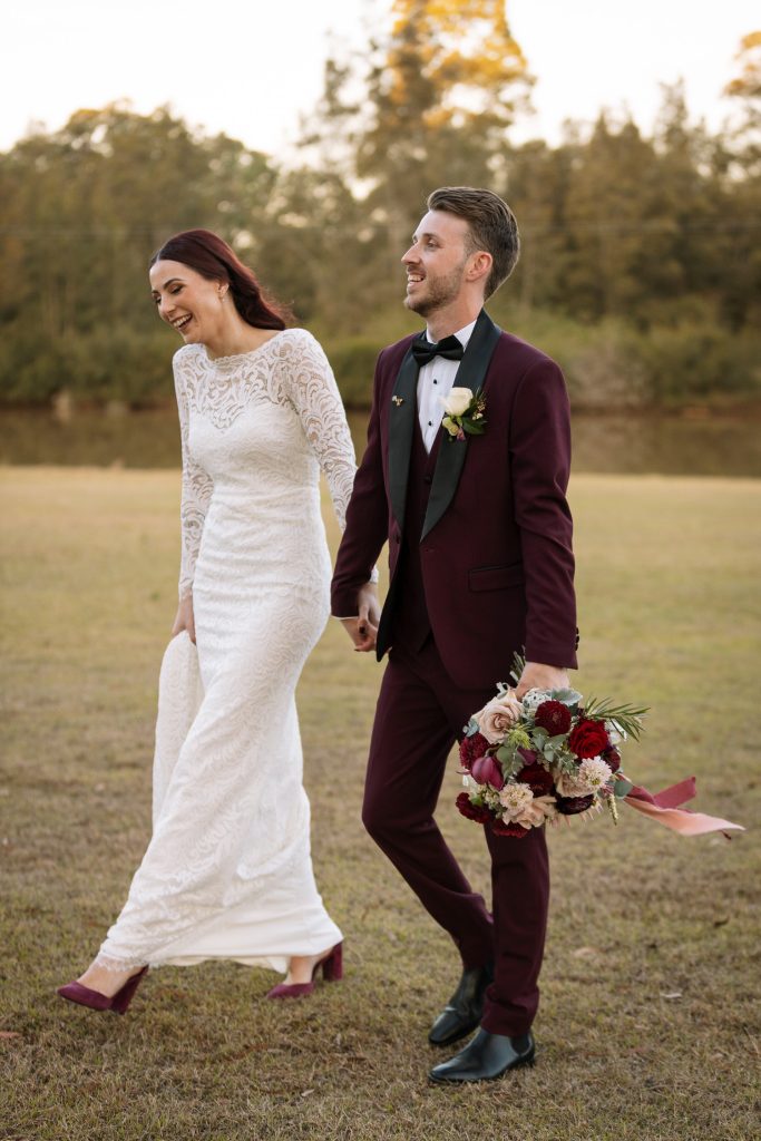 bride and groom walking on location photos at their wedding in the hunter valley