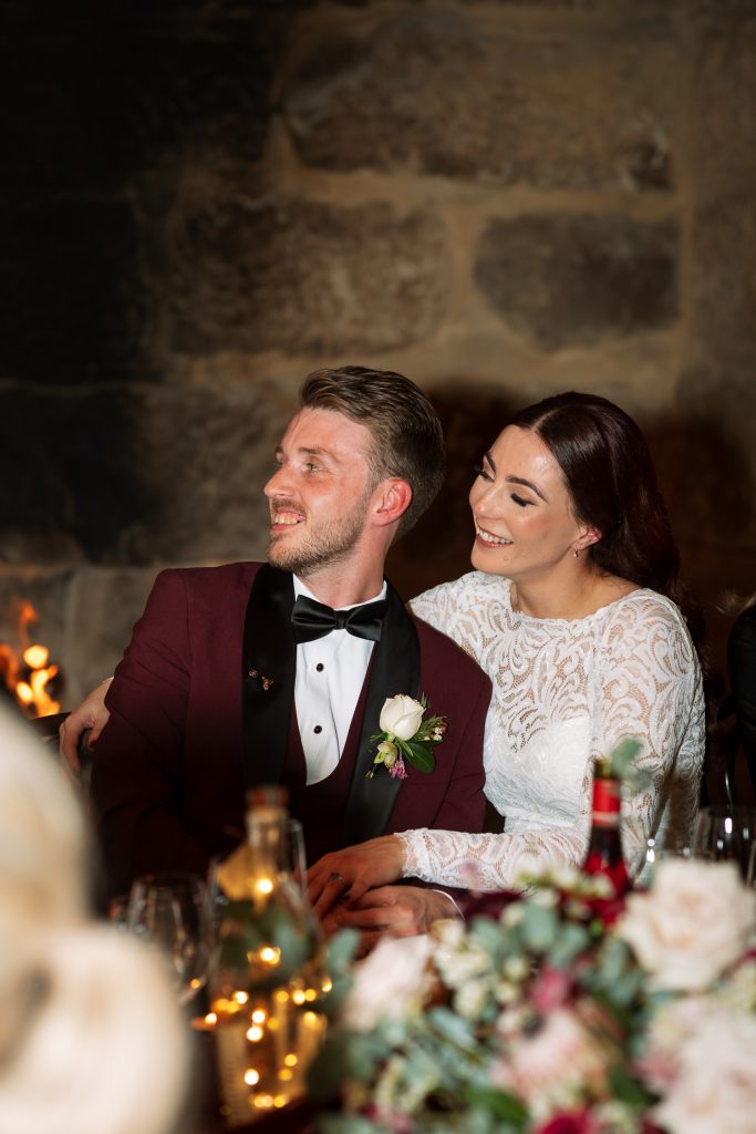 bride and groom laughing during speeches at the reception at their wedding in the hunter valley