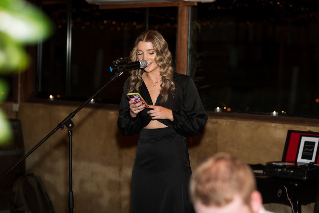 bride and groom laughing during speeches at the reception at their wedding in the hunter valley