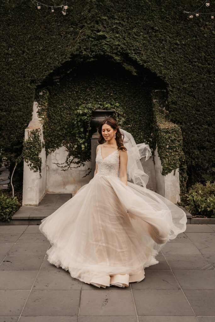 bride twirling her dress