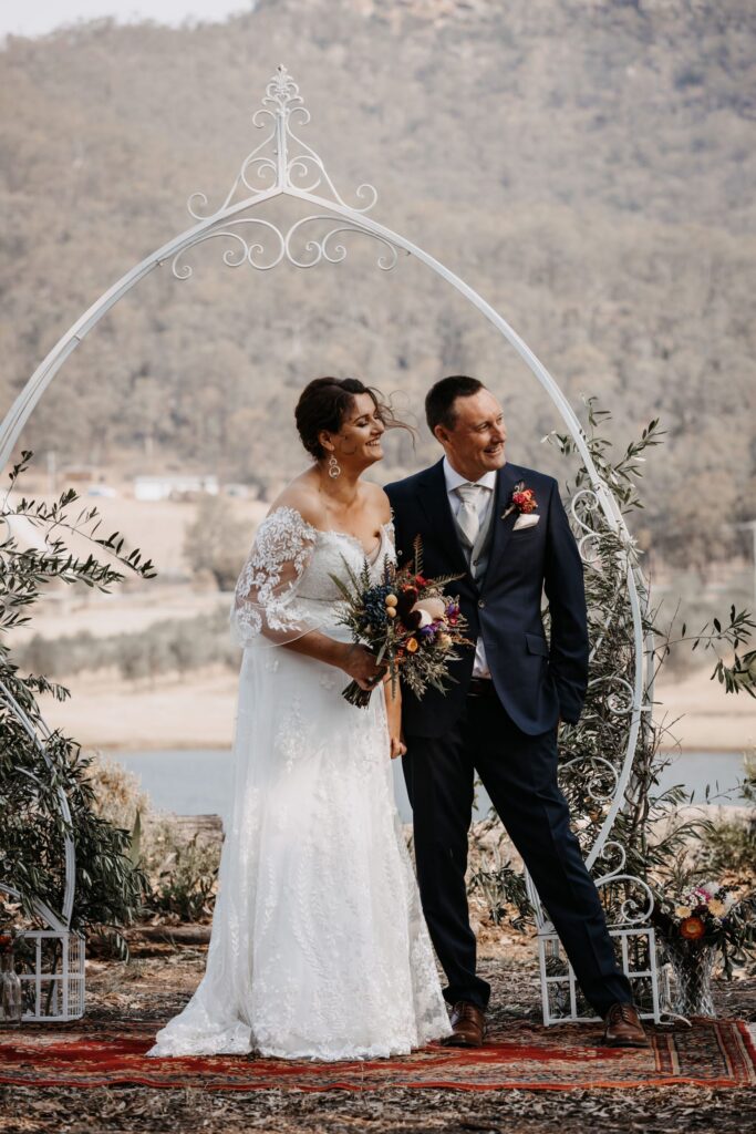 bride and groom at the alter