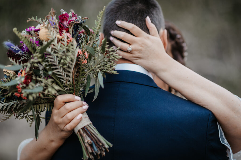 wedding couple shoot in broke with bouquet