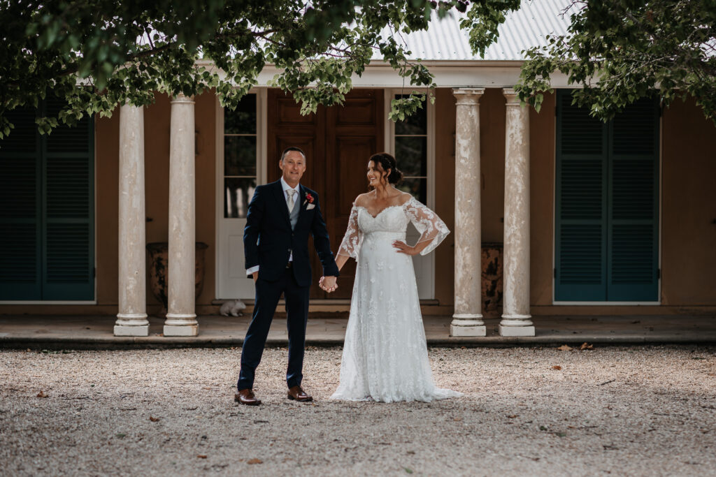 bride and groom in a winery hunter valley