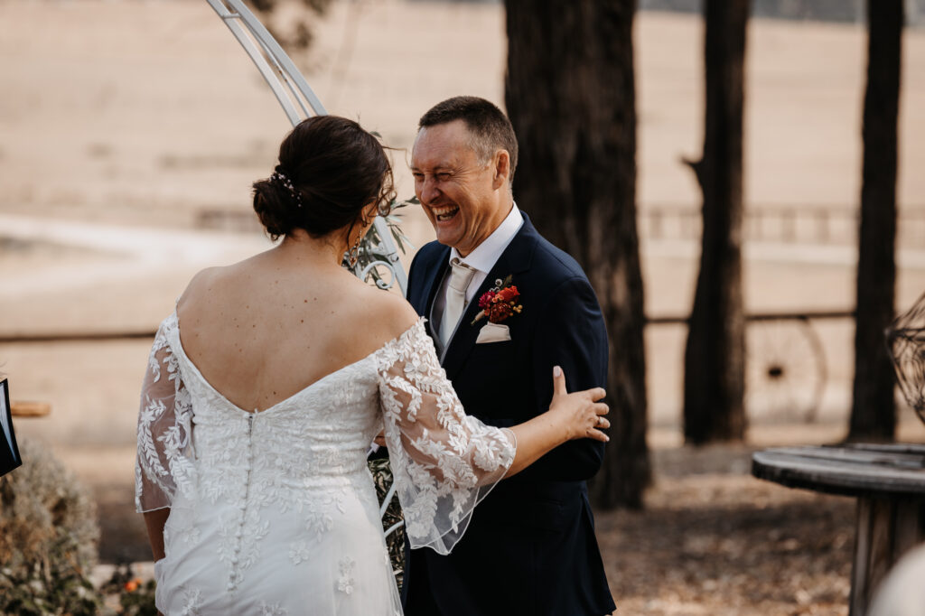 groom saying his vows at the alter