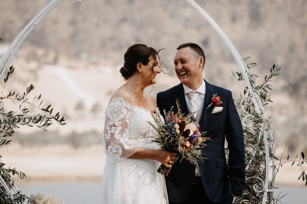 bride and groom at the alter