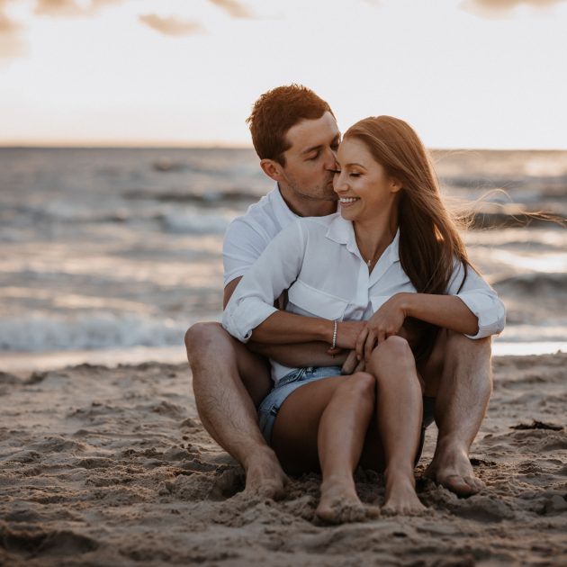 couple get close at Brighton beach, melbourne