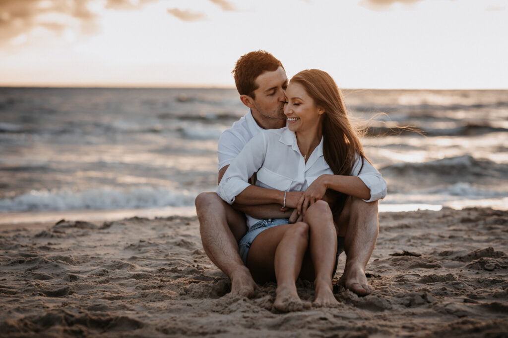 couple get close at Brighton beach, melbourne