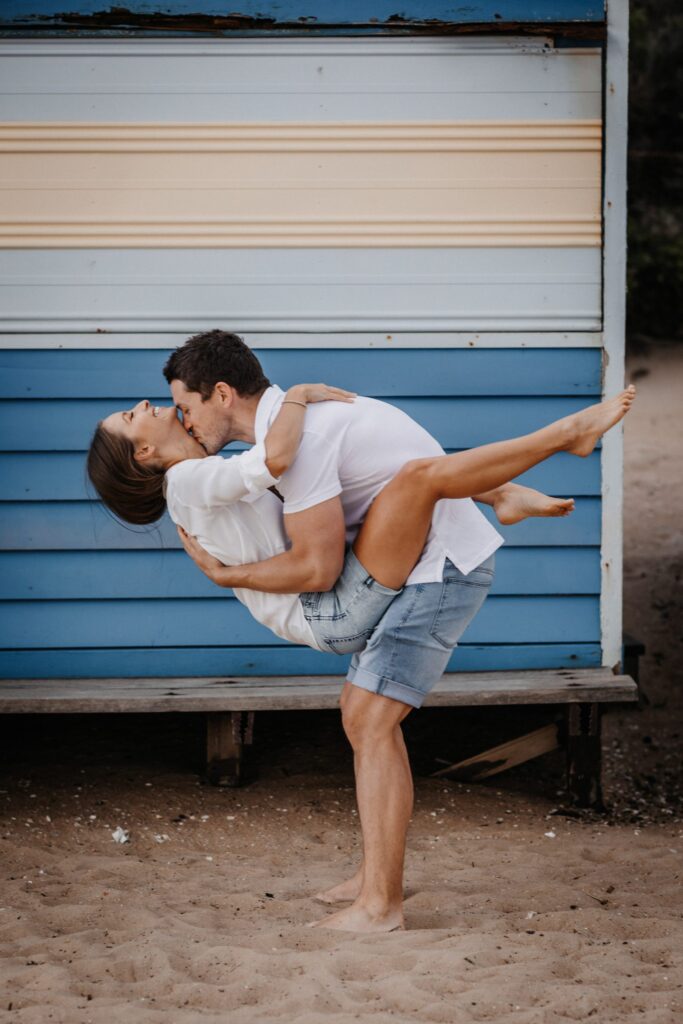couple at the Brighton beach boat houses
