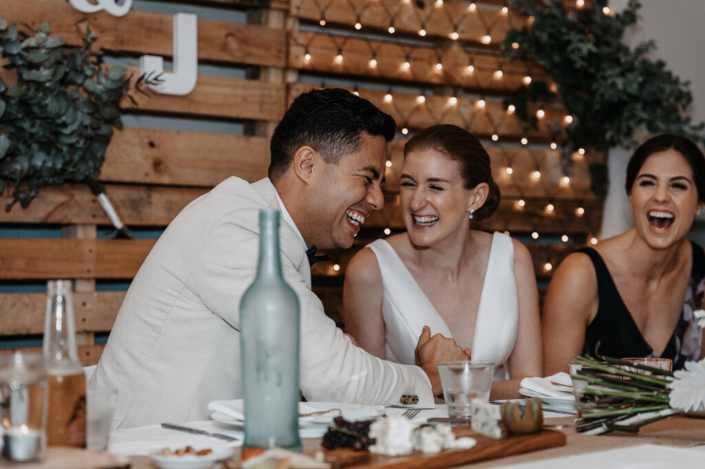bride and groom laughing in the hunter valley