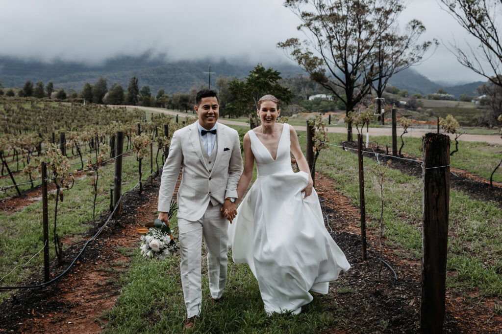 bride and groom in a vineyard