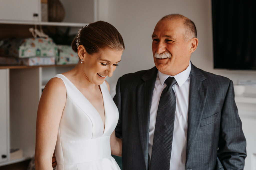 father of the bride with the bride