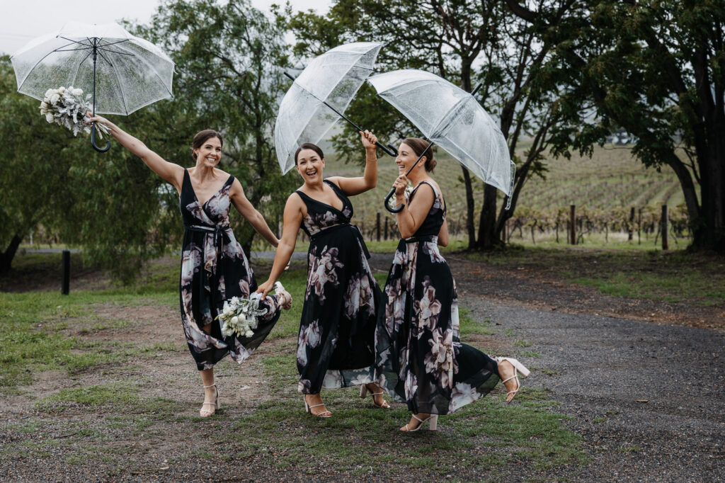 the bridal party ladies in the rain