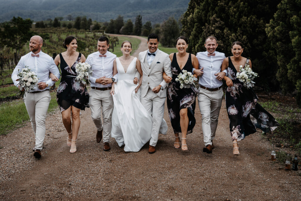 the bridal party walking in the hunter valley
