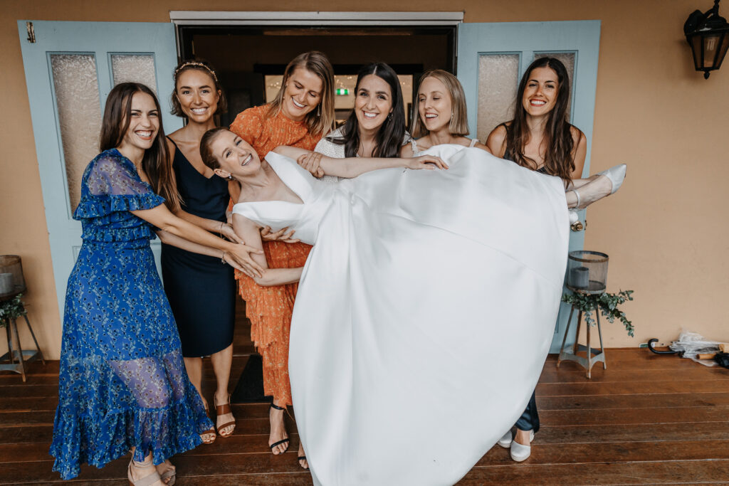 the ladies with the bride at her wedding