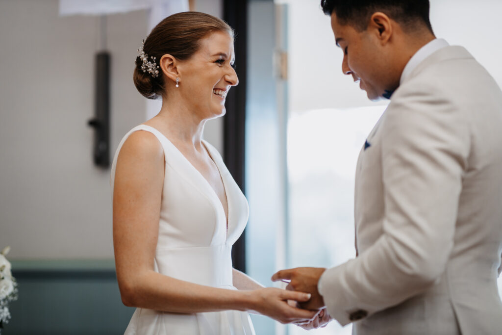 bride and groom exchanging vows