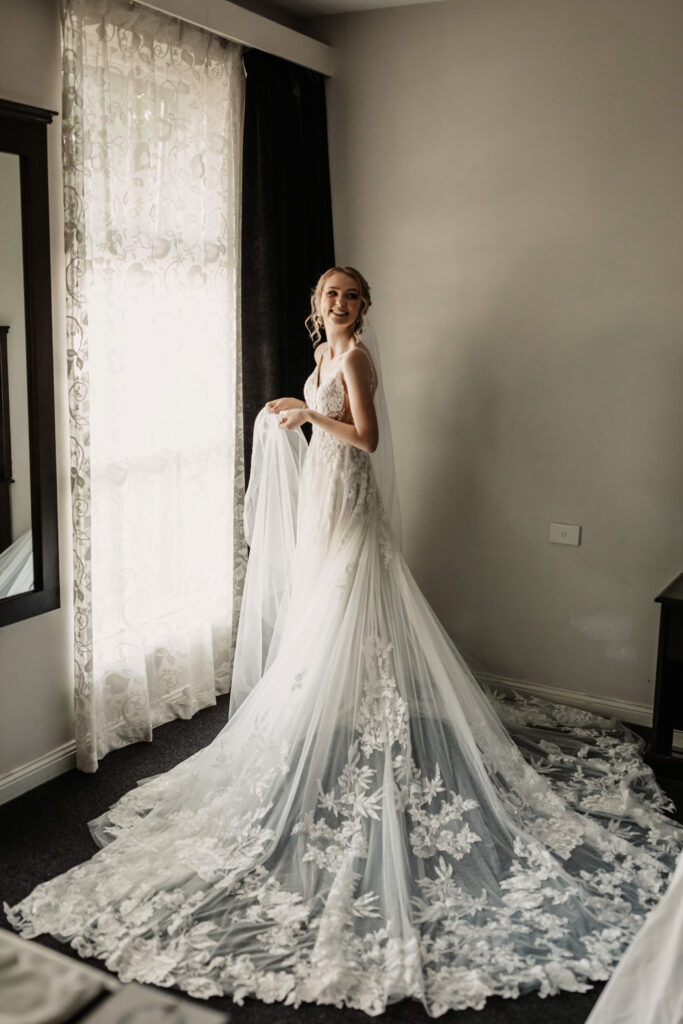 Bride in her dress getting ready in Wagga Wagga
