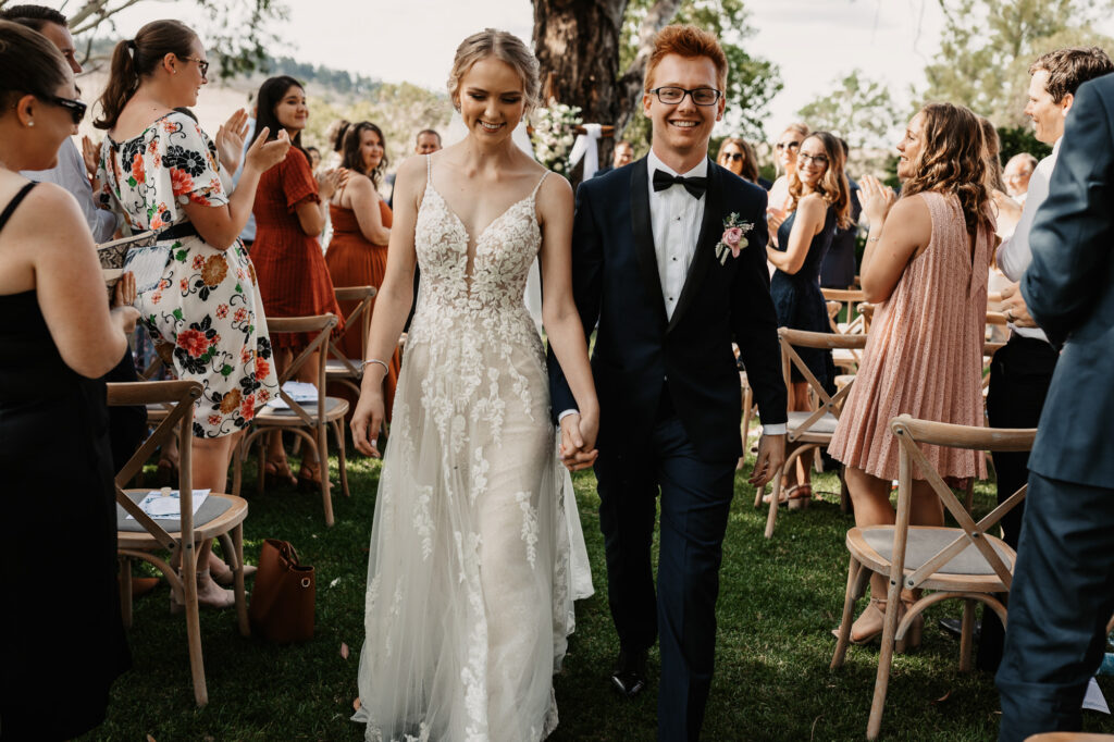 Husband and wife exiting the isle in Wagga Wagga