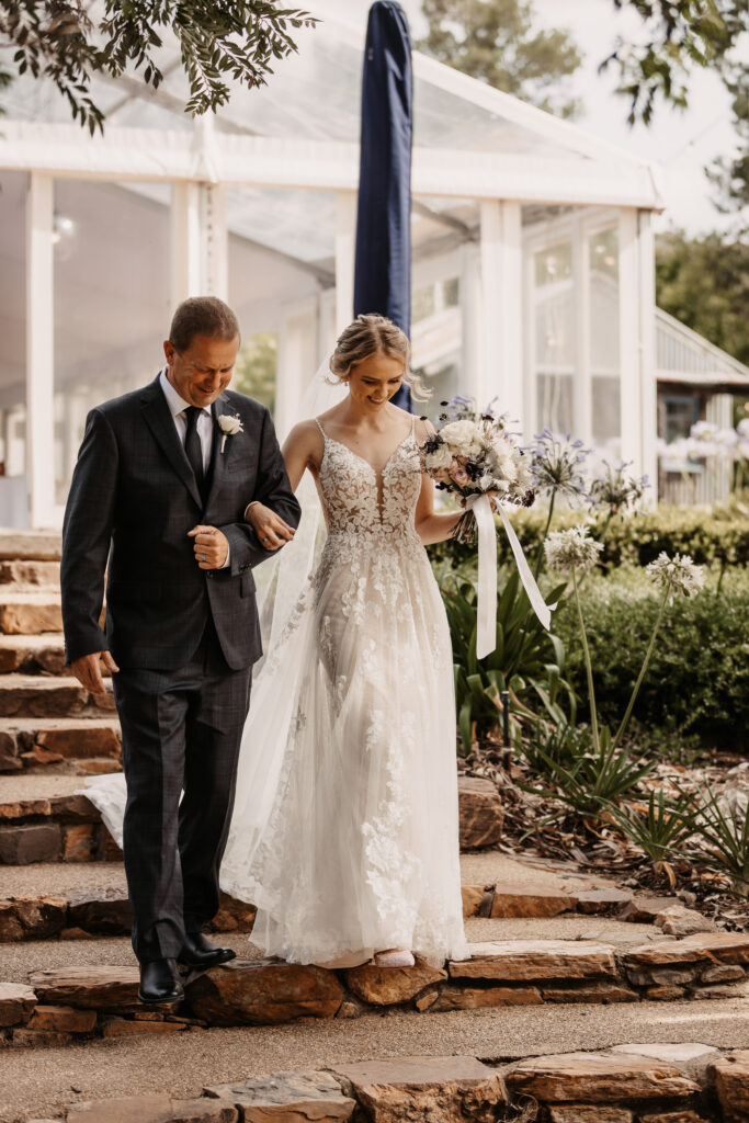Bride walking down the isle with father