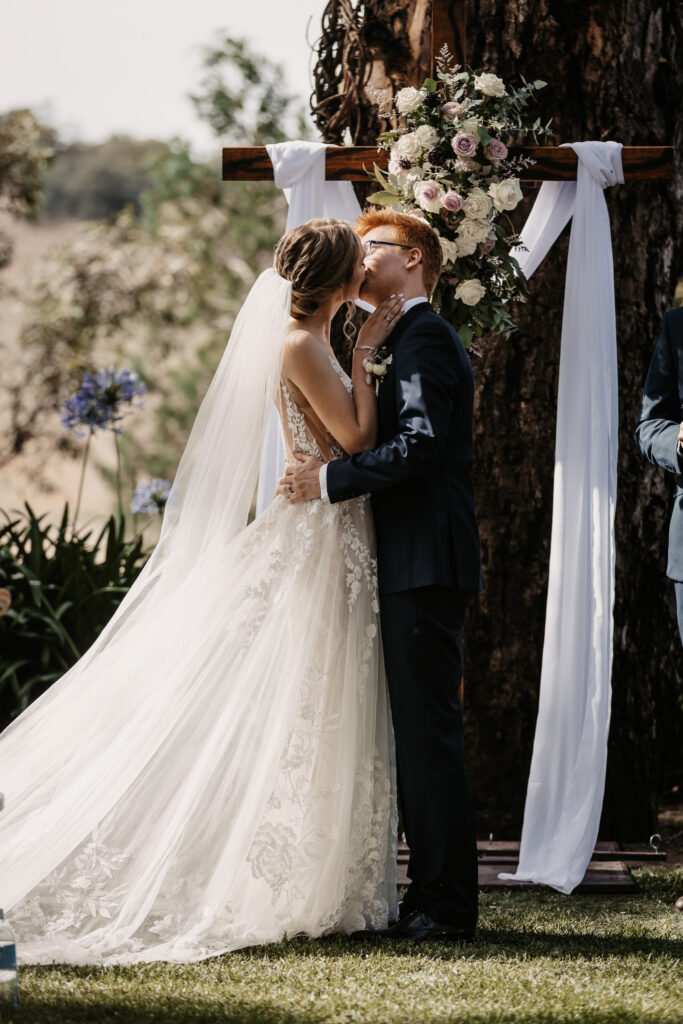 Bride and groom's first kiss at the ceremony Wagga Wagga