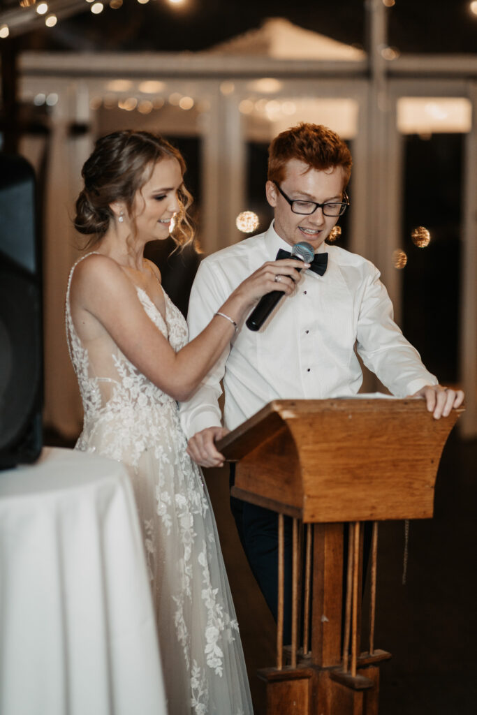 Husband and wife doing their speech at reception Wagga Wagga
