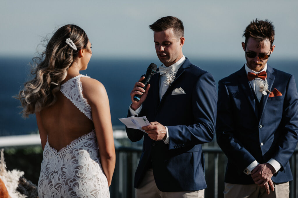 groom reading vows