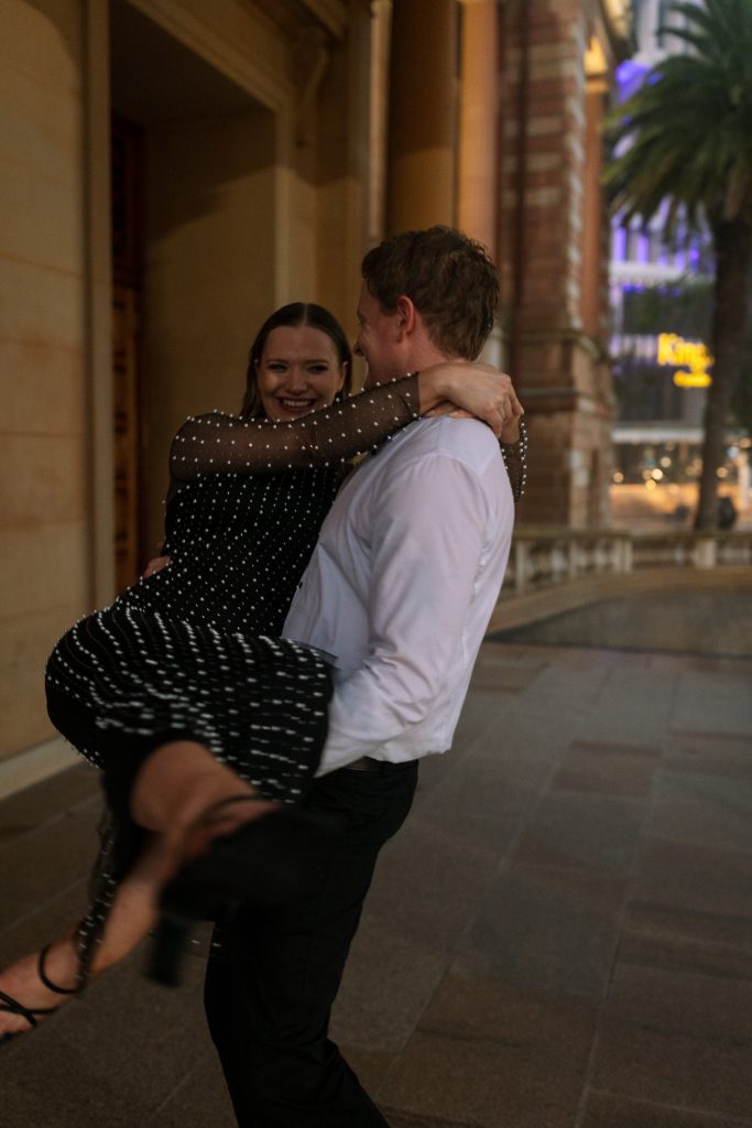 couple at custom house in Newcastle on their engagement session