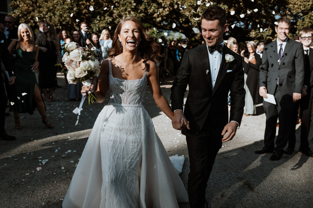 bride and groom exiting the isle