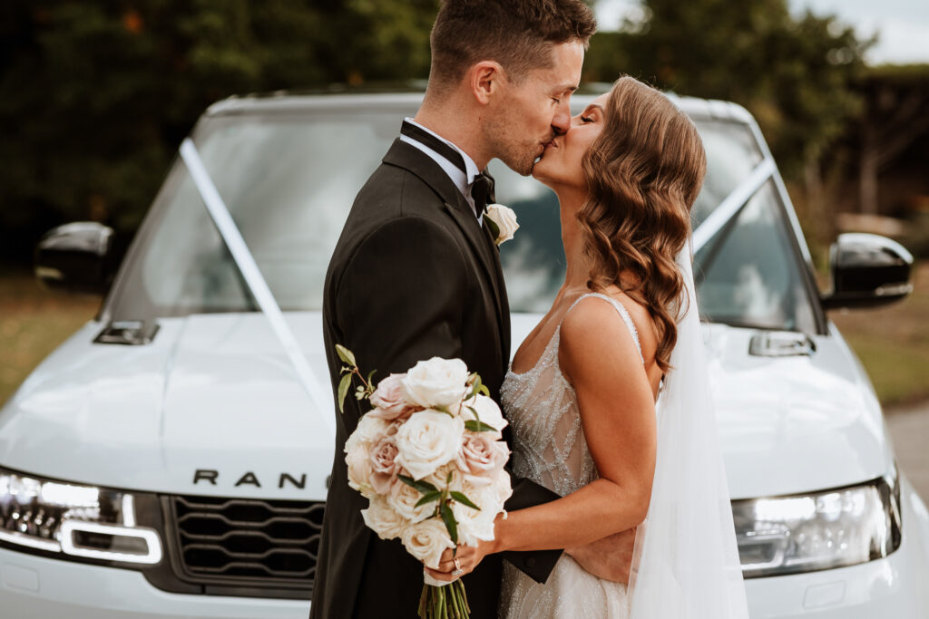 bride and groom on kissing