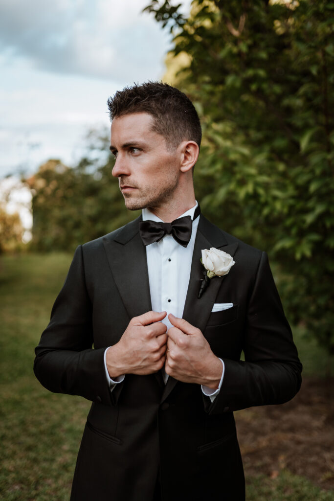 Groom and his suit at Coombes