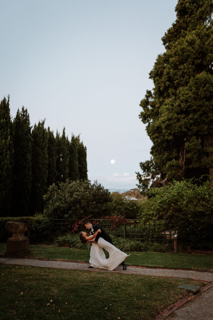 Husband and wife on a location shoot at Coombes under the moon