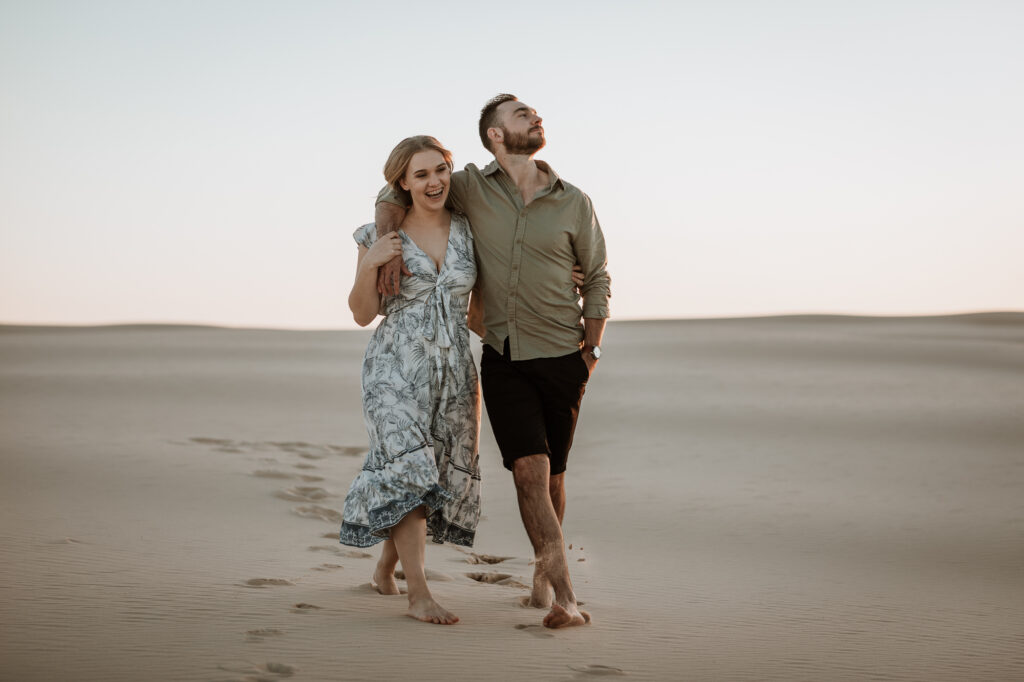Engagement Session on the sand dunes during sunset