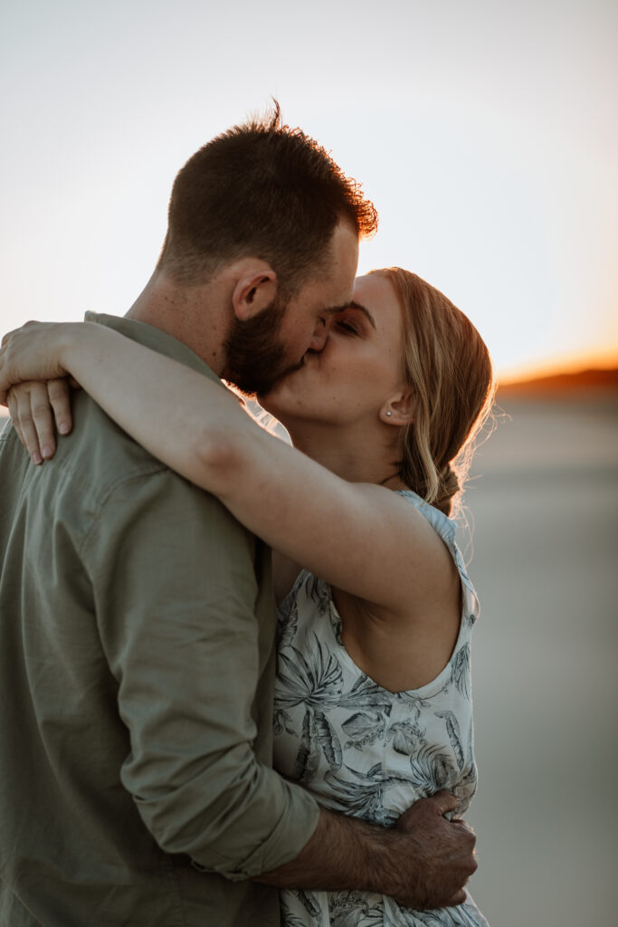 Engagement Session on the sand dunes during sunset