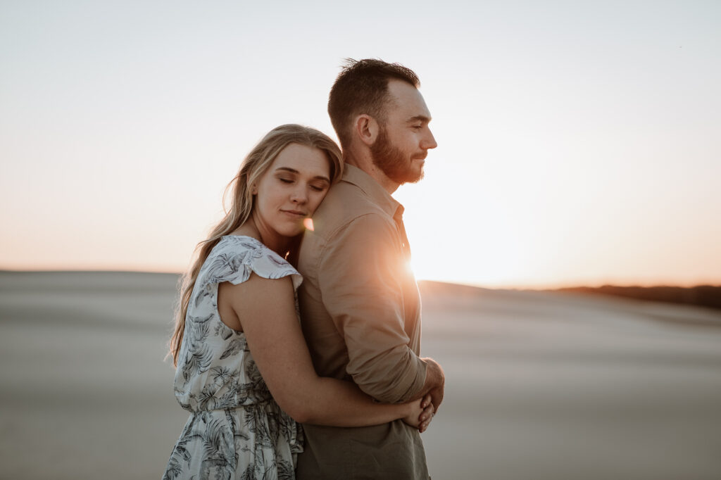 Engagement Session on the sand dunes during sunset