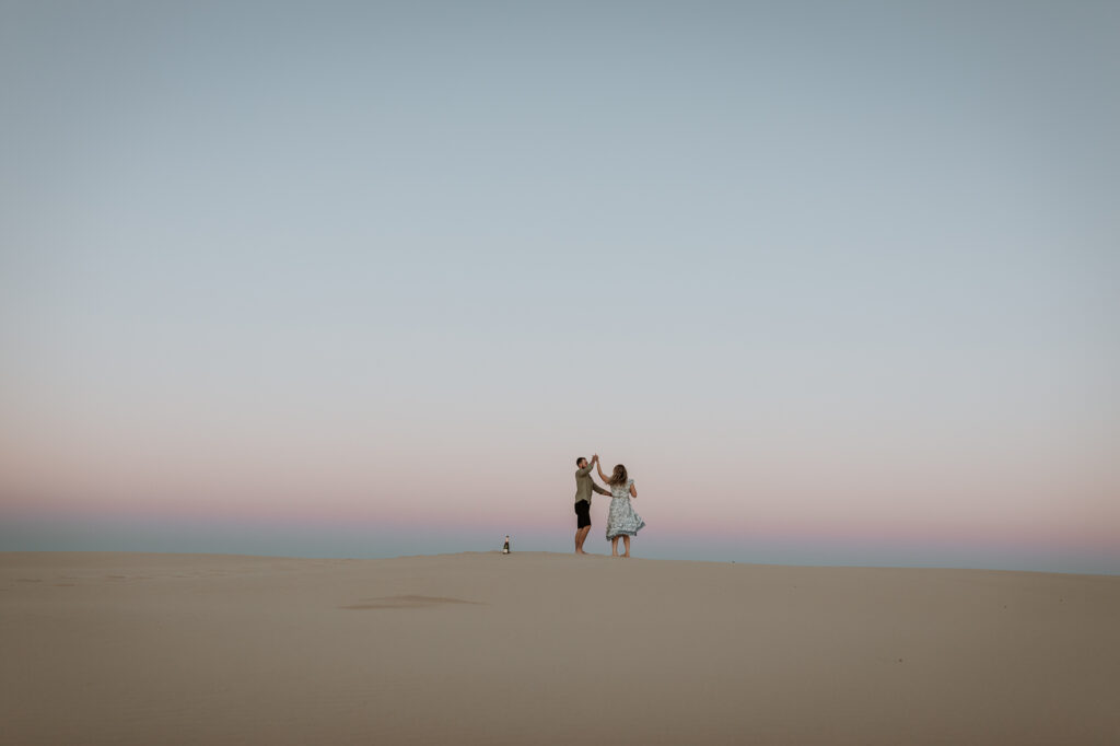Engagement Session on the sand dunes during sunset