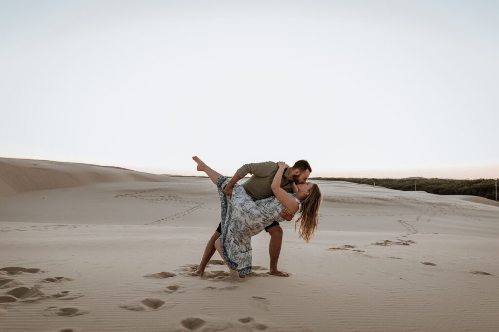 Engagement Session on the sand dunes during sunset