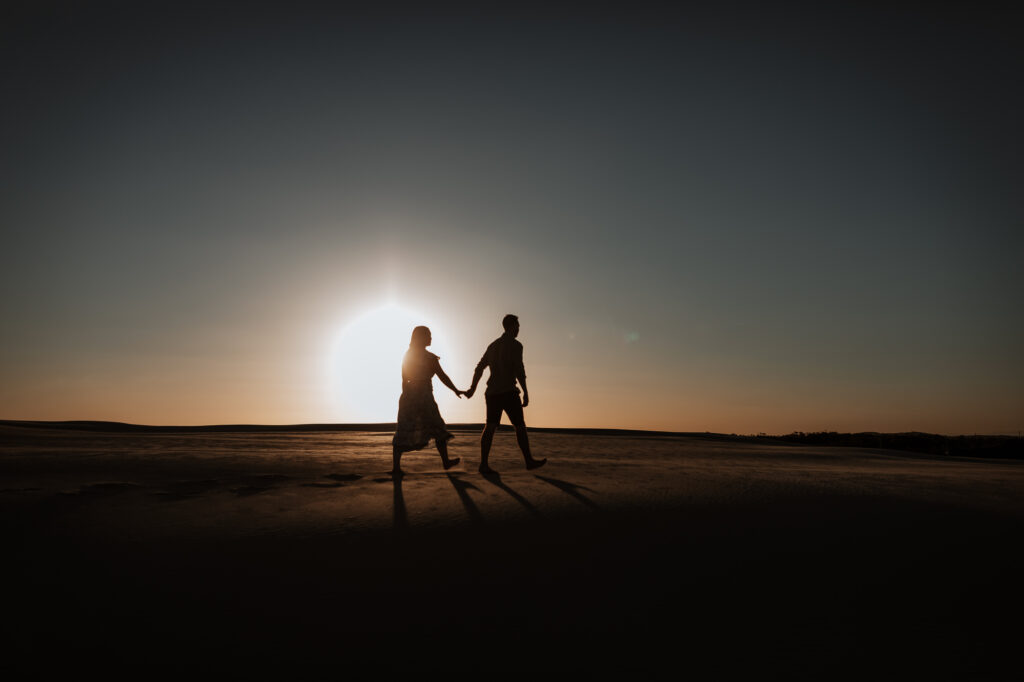 Engagement Session on the sand dunes during sunset