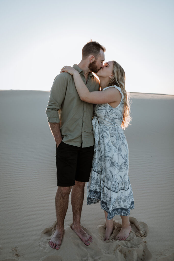 Engagement Session on the sand dunes during sunset