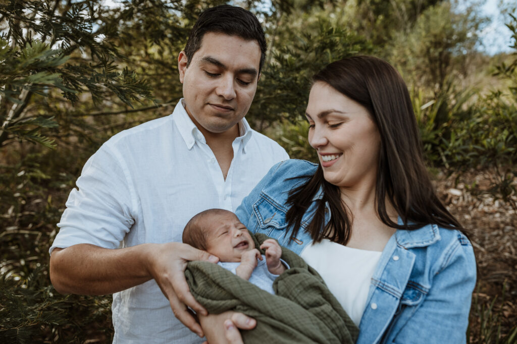 mum and dad with new born baby