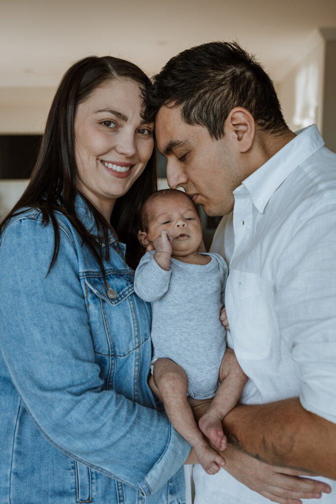 mum and dad with new born baby