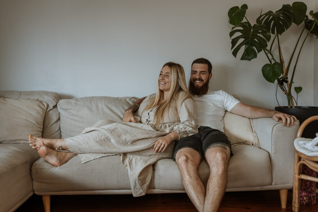 mummy and daddy relaxing on the couch without the kiddies