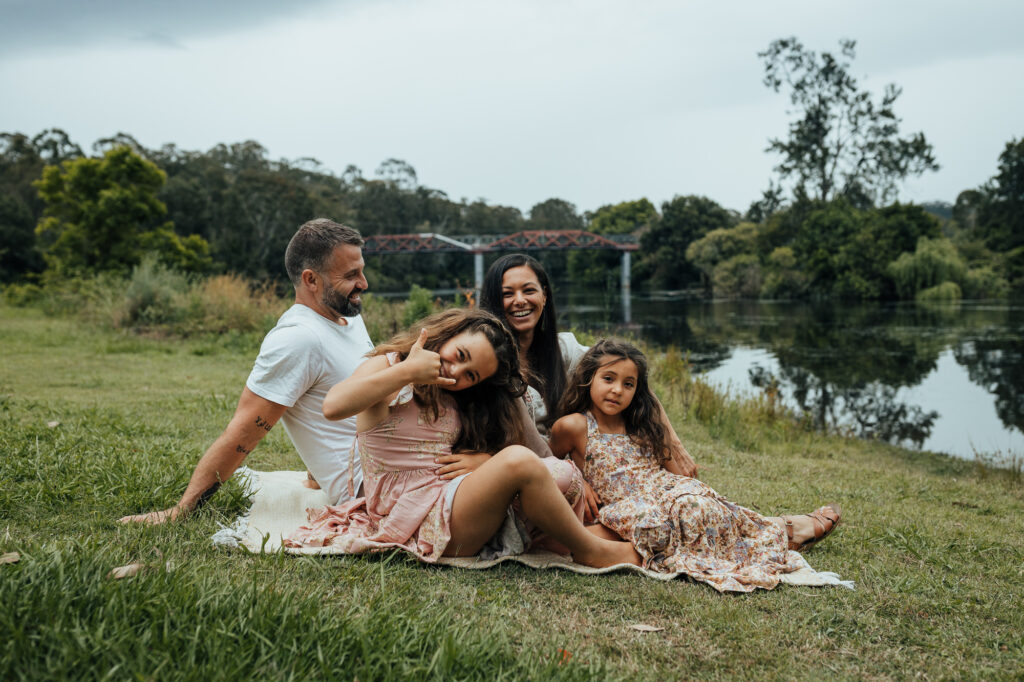 family photo on a picnic rug