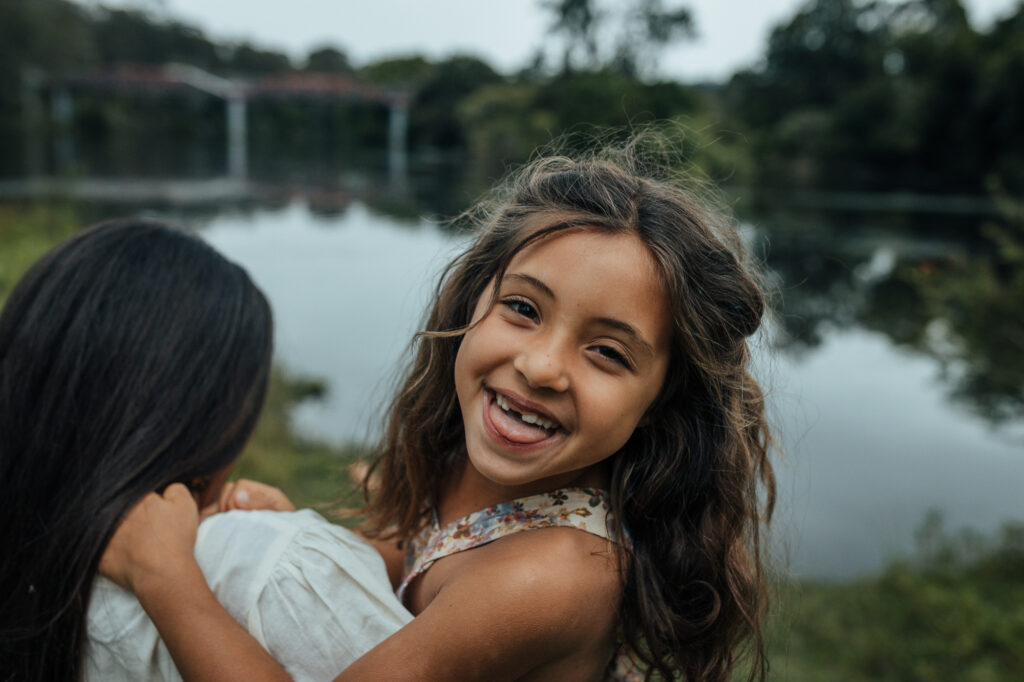 young daughter being cheeky to the camera