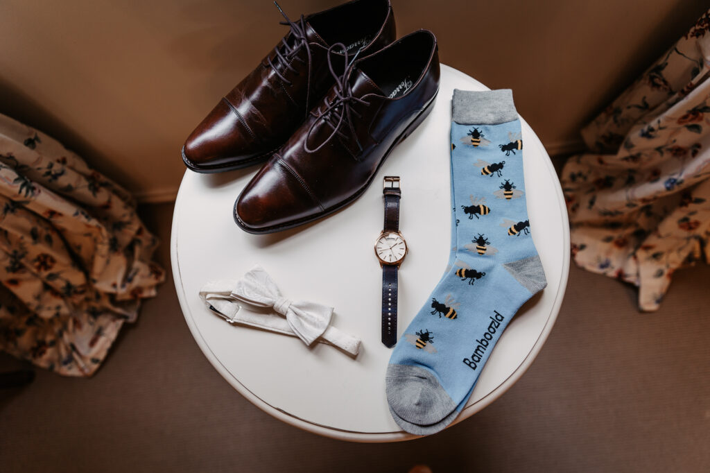 groom's accessories on a table