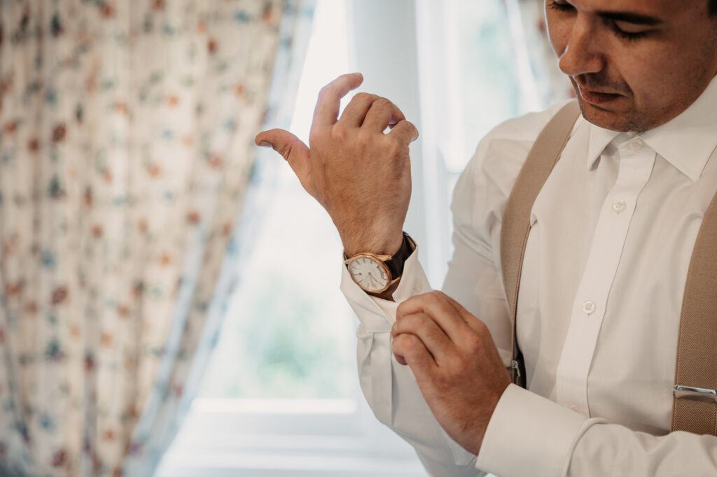 groom getting ready for his wedding day